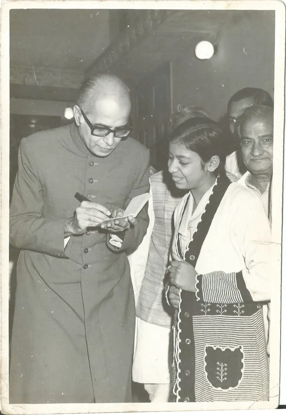 Shri L.K. Advani signing an autograph for a young Mira Aggarwal, late 1970s