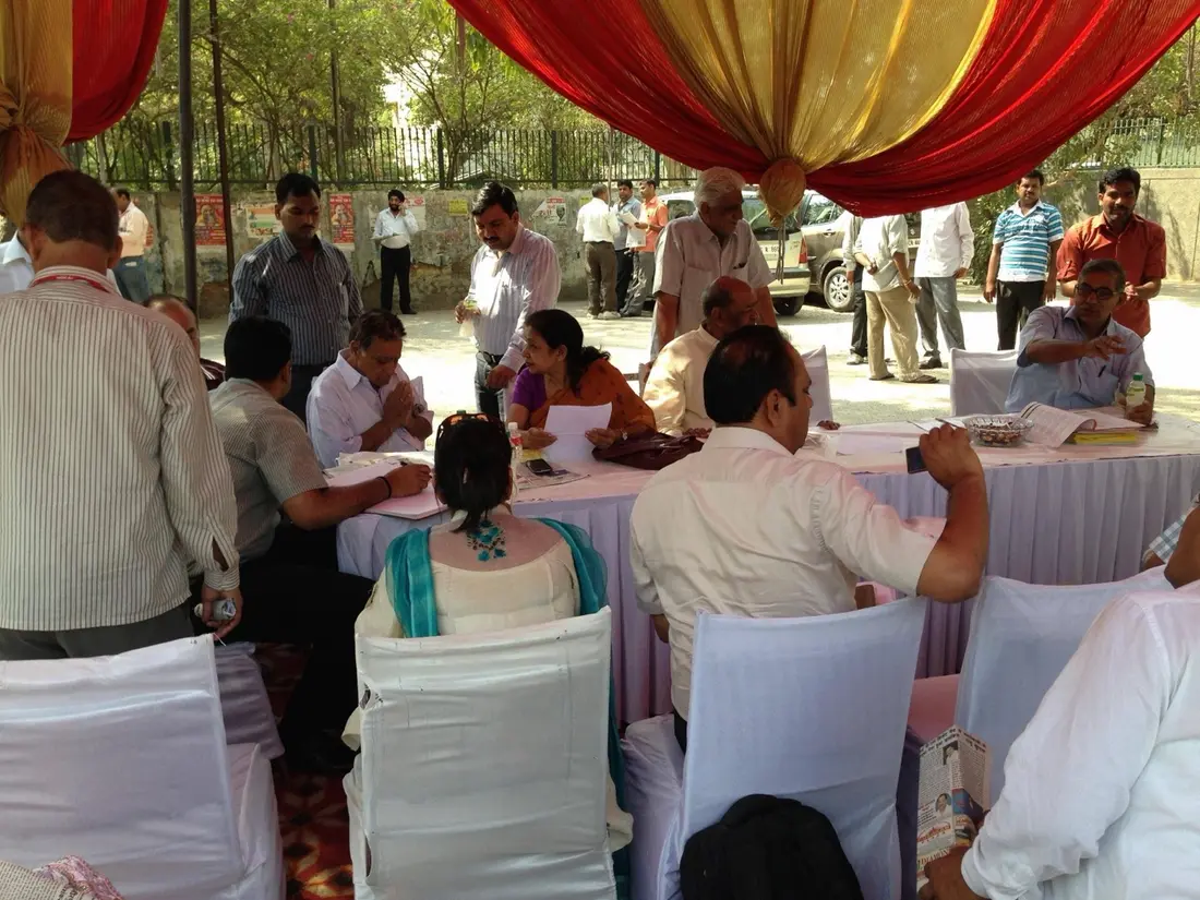 Mira Aggarwal listening to citizens at an outdoor public grievance camp